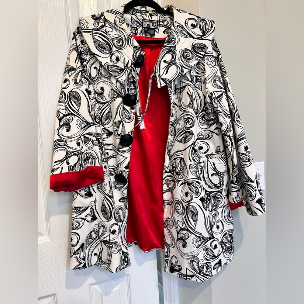 Fantastic Black, Red and White duster jacket.  Non smoker. Great condition.
